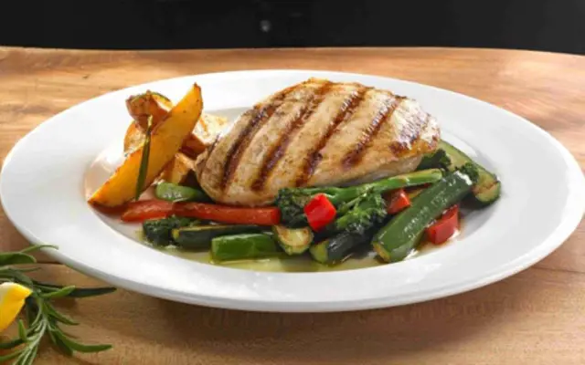 Grilled Chicken with Potato Wedges and Stir-Fry Vegetables