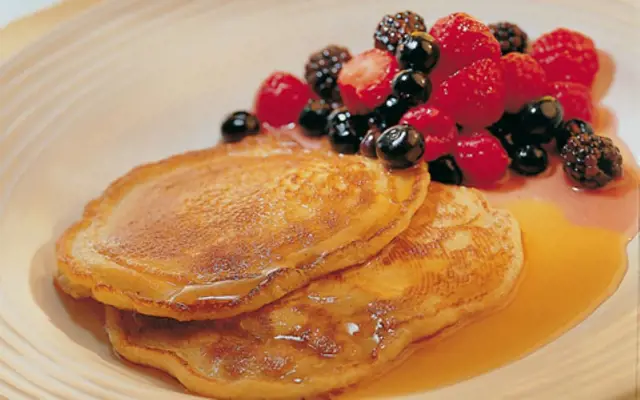 Warm Pancakes with Berries and Maple Syrup