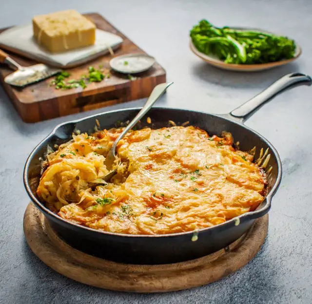 Golden Potatoes with Sticky Onions & Cheddar