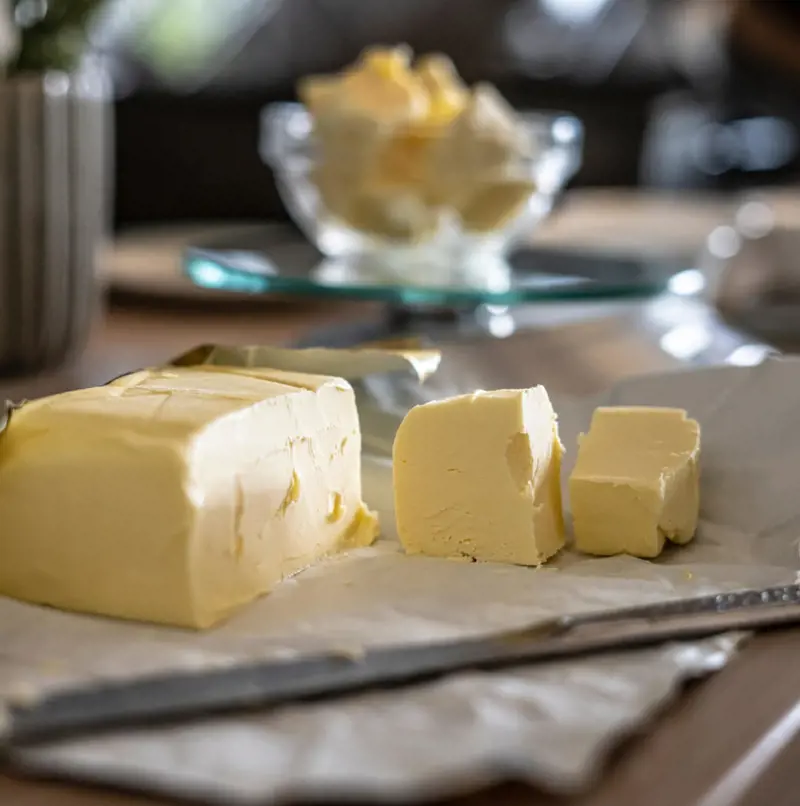 Block of butter cut up into smaller pieces