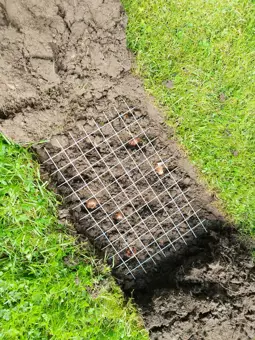 Net being put down on soil
